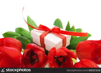 Photo of fresh tulip bouquet, little gift box for mom, festive still life, isolated on white background, happy mothers day, valentine day, present for birthday, love and romance concept&#xA;