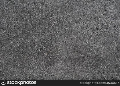 Photo of gray asphalted surface background. Close up