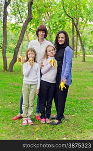 Photo of group people are eating bananas