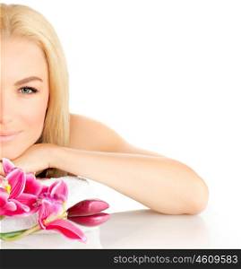 Photo of half woman face, beautiful young lady in spa, cute female enjoying aromatic massage, good looking girl with pink orchid flowers isolated on white background, spa relaxation concept