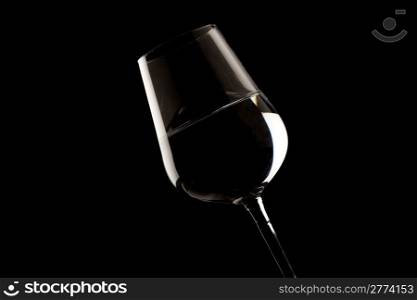 photo of highlighted wine glass edges on black background