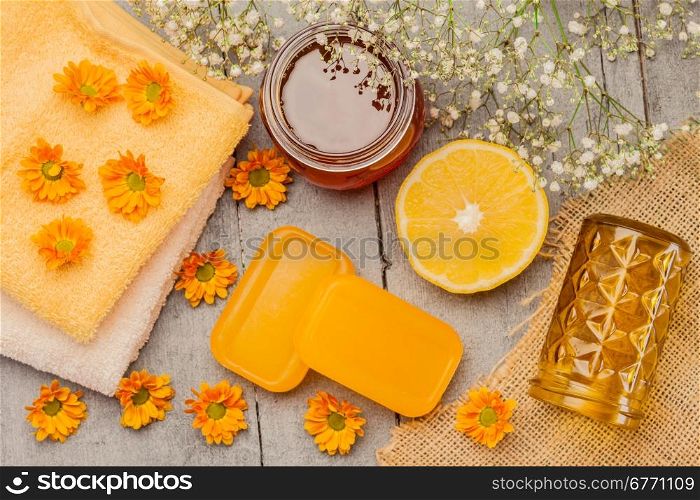 Photo of honey soap over wooden table