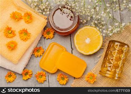 Photo of honey soap over wooden table