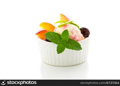 photo of Ice cream with fruits on isolated white background