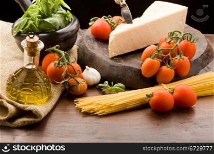 photo of ingredients for coocking spaghetti with tomatoe sauce
