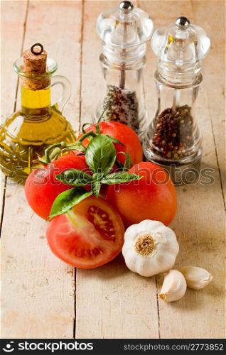 photo of italians most used ingredients for preparing food on wooden table