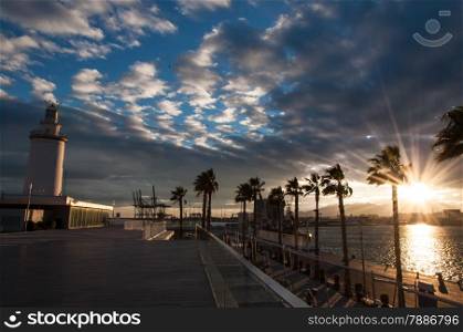 Photo of Lighthouse in Malaga in Andalusia, Spain at sunset