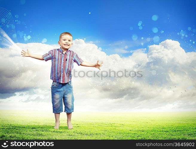 Photo of little boy jumping and raising hands
