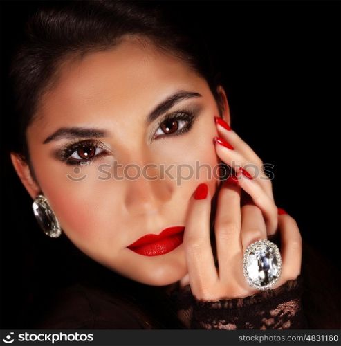 Photo of luxury female wearing stylish jewelery, closeup portrait of beautiful woman with seductive makeup isolated on black background, sexy girl, red lips, Valentine day, beauty and elegance concept