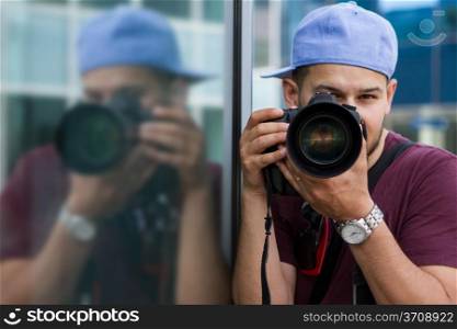 Photo of male photographer with dslr