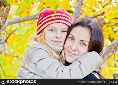 Photo of mother and daughter in autumn