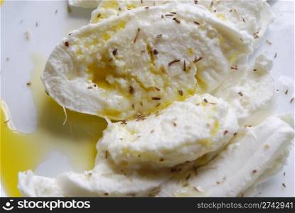 photo of mozzarella cheese and olive oil