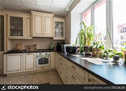 Photo of new modern kitchen interior. New modern kitchen interior