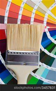 photo of Paintbrush with card of colors