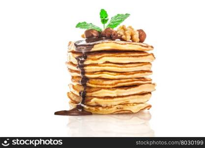 Photo of pancakes with chocolate and nuts over white isolated background
