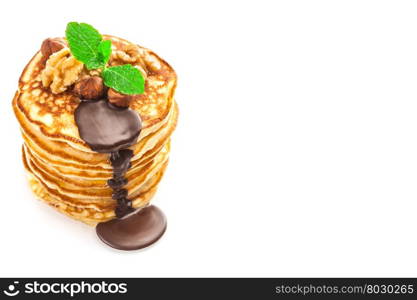 Photo of pancakes with chocolate and nuts over white isolated background