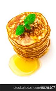 Photo of pancakes with honey over white isolated bachground
