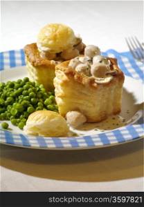 Photo of Pastetli, a traditional Swiss vol-au-vent meal made with a white wine sauce and a mushroom and meat filling.