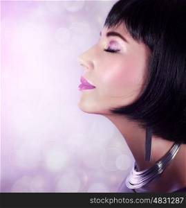 Photo of pretty woman with closed eyes isolated on purple blur background, side view of gorgeous female with fashionable haircut and festive makeup, luxury silver necklace, New Year party