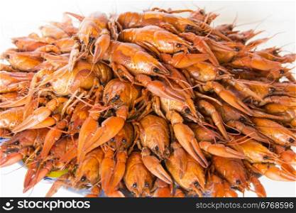 Photo of red boiled crawfishes on the dish&#xA;