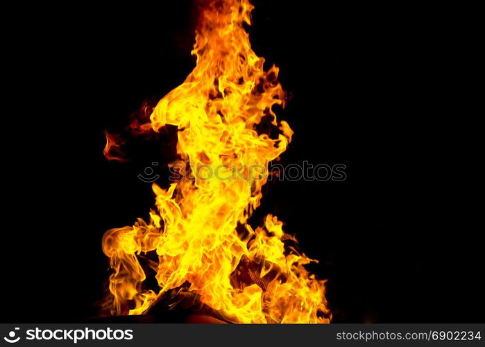 Photo of red fire flame on black background