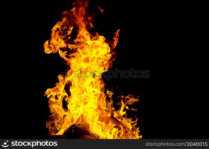 Photo of red fire flame on black background. Red fire flame on black background