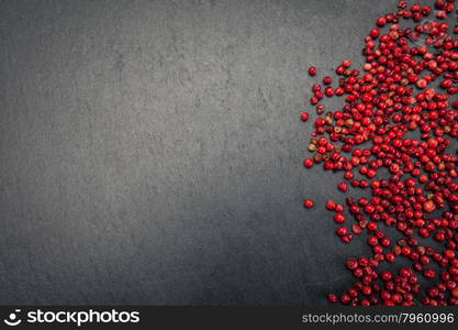 Photo of red pepper over stone table