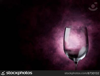 Photo of Red Wine inside a wine glass with abstract background