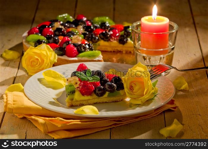 photo of romantica photo composed of pie with petals and candle light