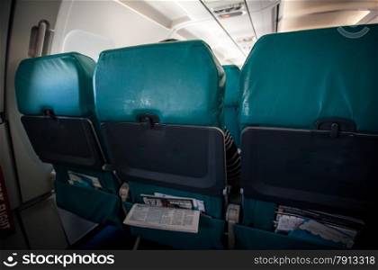Photo of row of airplane seats in low cost aircraft