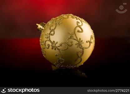 photo of shiny round christmas balls in front of rural background