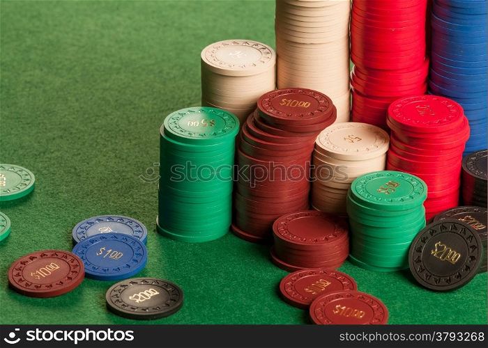 Photo of stacks of generic antique poker chips.
