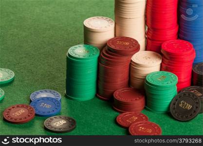 Photo of stacks of generic antique poker chips.