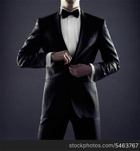 Photo of stylish man in elegant black suit