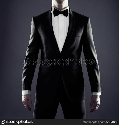 Photo of stylish man in elegant black suit
