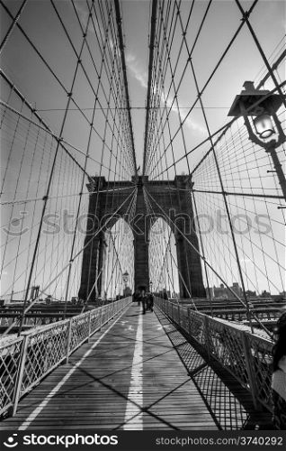 Photo of the Brooklyn Bridge in New York done in black and white.