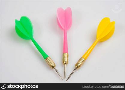 Photo of three darts arrow of different colors