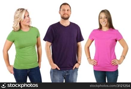 Photo of three young adults wearing different coloured blank t-shirts. Ready for your design or artwork.