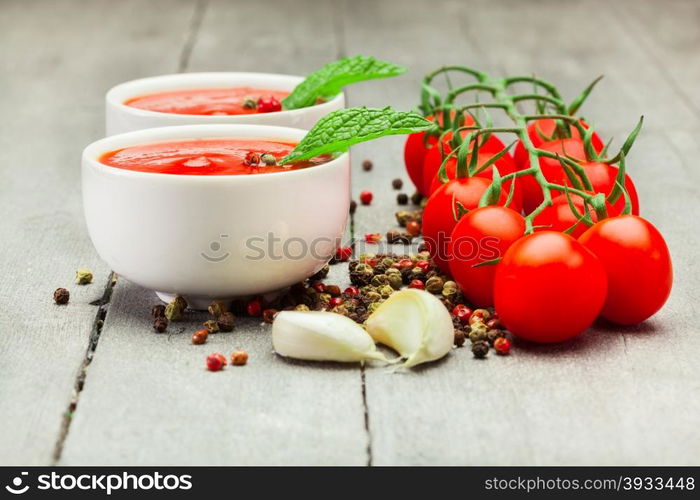 Photo of tomato sauce over wooden table