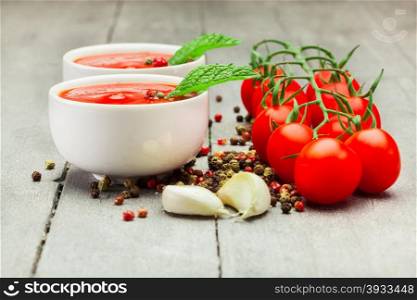 Photo of tomato sauce over wooden table