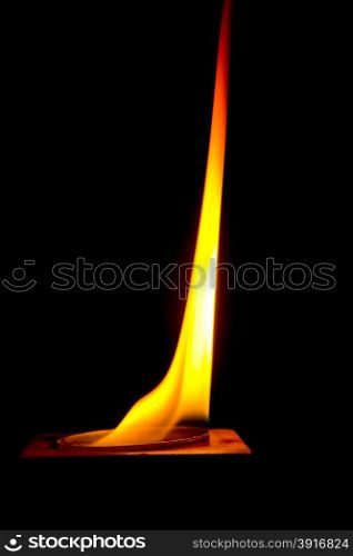 Photo of tongue flame on dark background