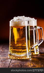 photo of traditional german beer glass on wooden table