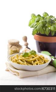 photo of traditional italian food pasta with pesto with different ingredients