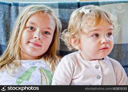 Photo of two cute girls with blue eyes