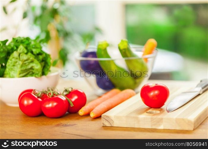 Photo of veggie on a wooden cut board