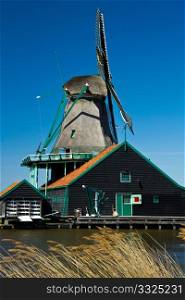 Photo of windmill in Holland with blue sky