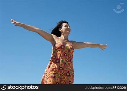 Photo of woman relaxing with sky background