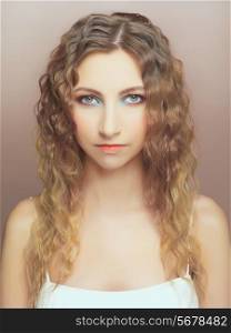 Photo of young beautiful lady with long curly hair