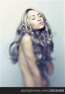 Photo of young beautiful lady with magnificent blond hair