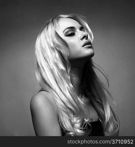 Photo of young beautiful lady with magnificent blond hair